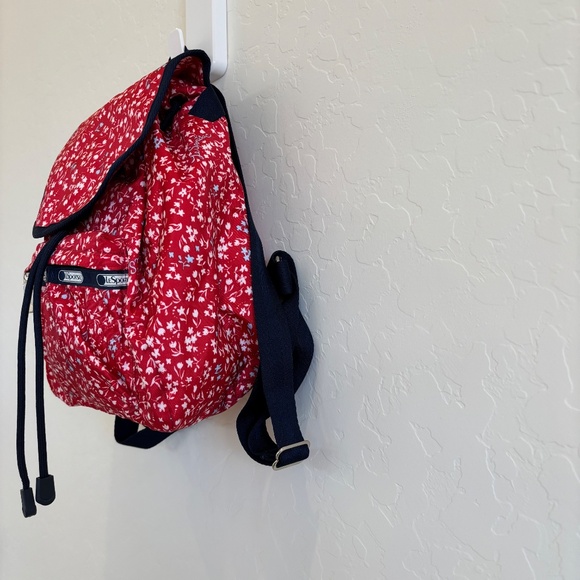 LeSportsac Small Edie Backpack in red with a white and blue floral pattern. - Picture 2 of 12